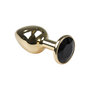 Glatter-goldener-Buttplug-mit-schwarzem-Kristall